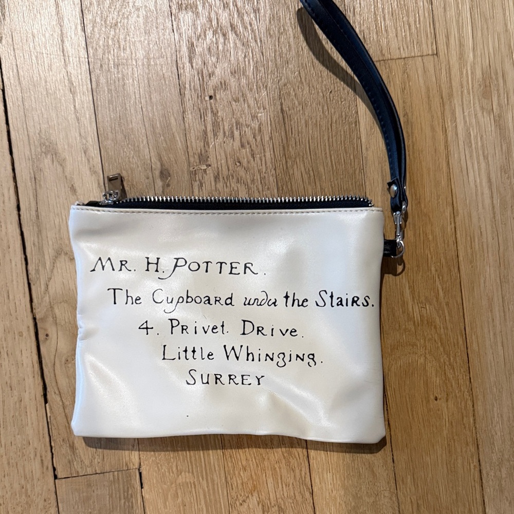 White Wristlet with Black Text